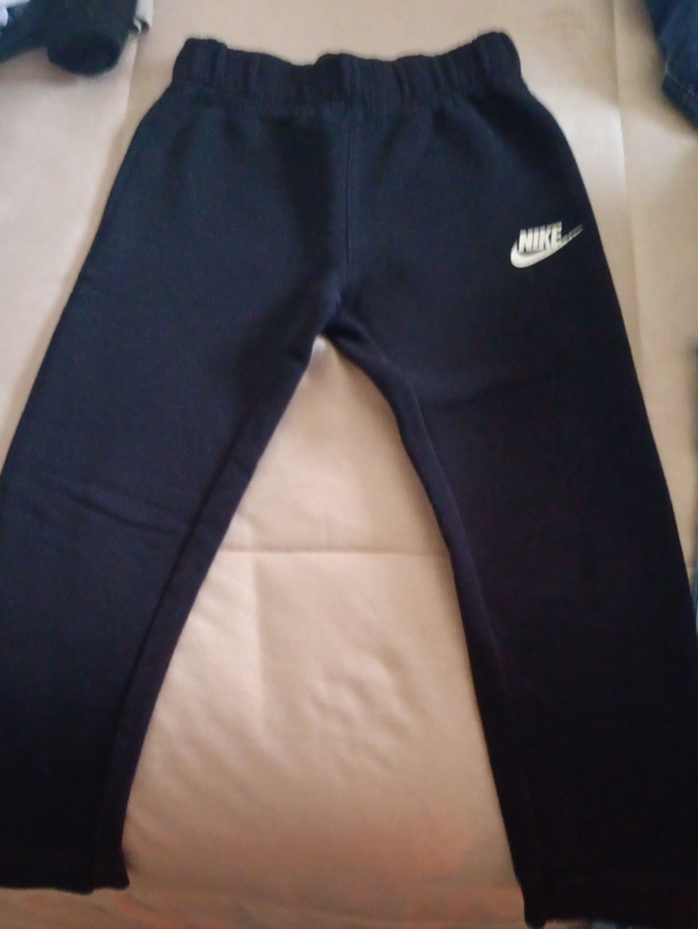 Nike Black Jogger Sweatpants with White Swoosh